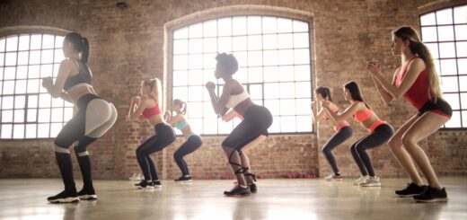 group of women doing exercise inside the building